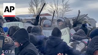 Hundreds protest in Russia over activists being arrested [upl. by Anaujd]